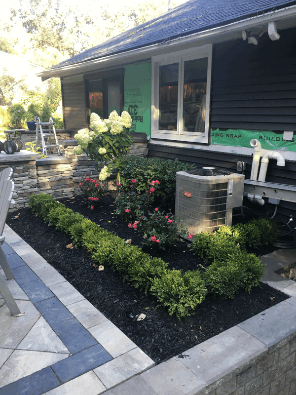 Back yard landscaping project - brick pavers after