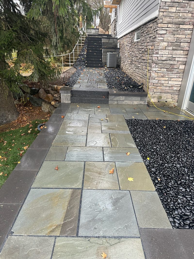 Bluestone walkway with stone veneer