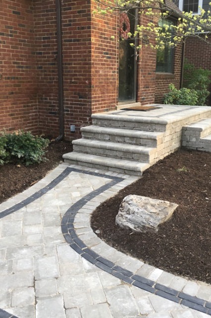 brick paver front walkway with contrasting border pavers