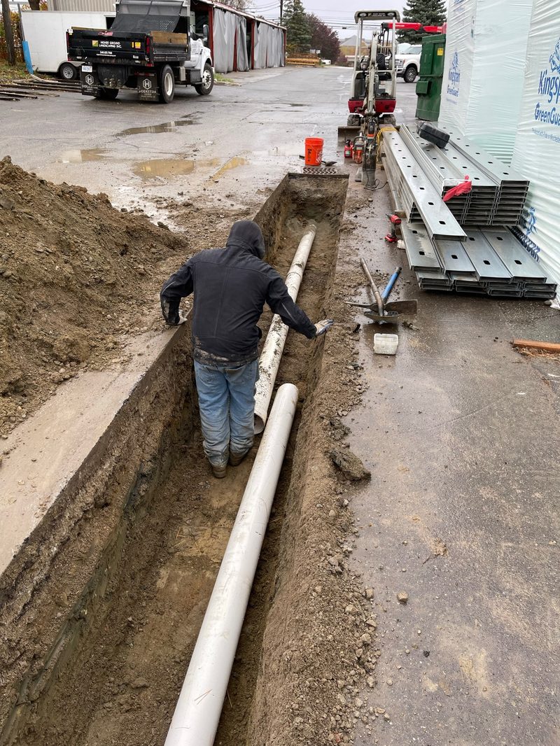 Commercial drainage trench with large pipe