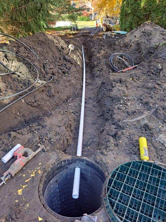Drainage trench with catch basin in fall