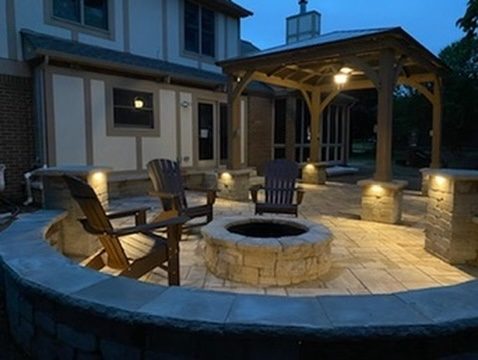 Fire pit with seating at dusk