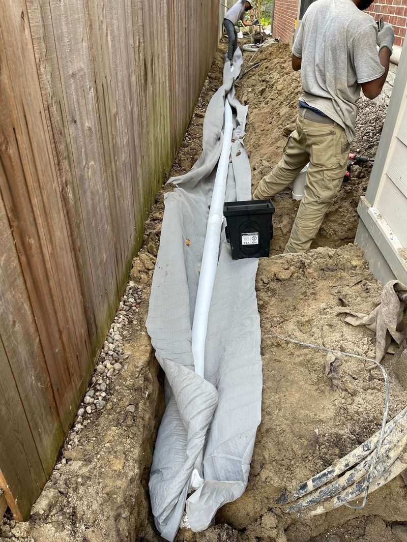 French drain with filter fabric installation
