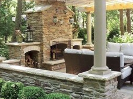 stone paver patio, outdoor space and fireplace