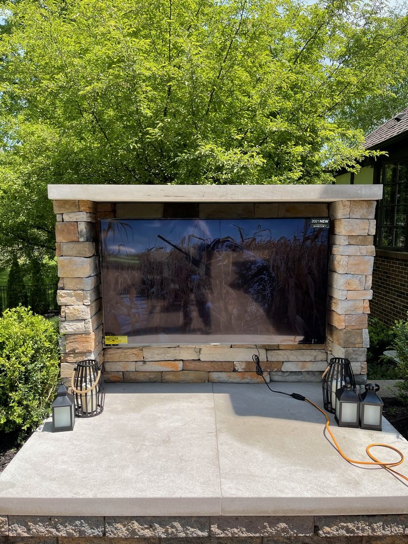 Outdoor TV in stone surround