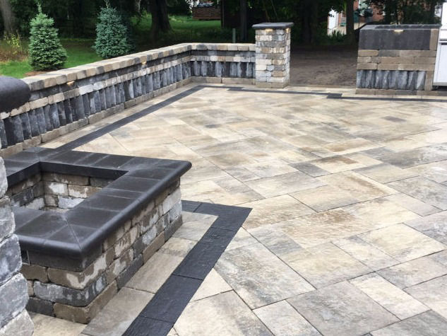 stone paver outdoor fireplace installation