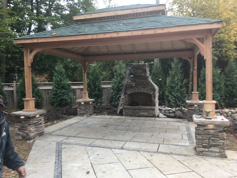 Timber pavilion with stone fireplace