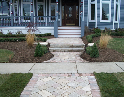 Front of home landscaped in Troy